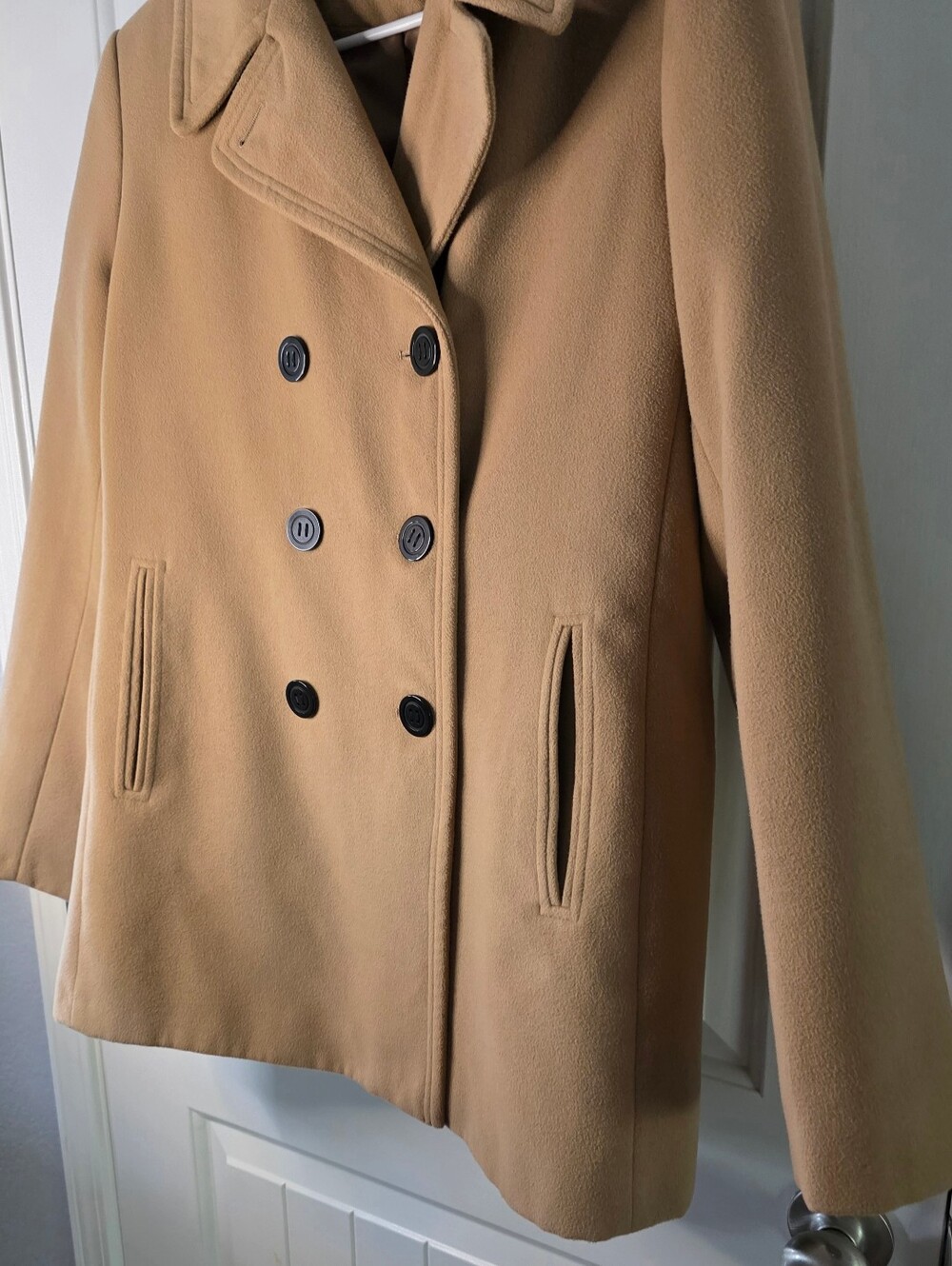 Metaphor camel coat features a structured collar and a classic double breasted L